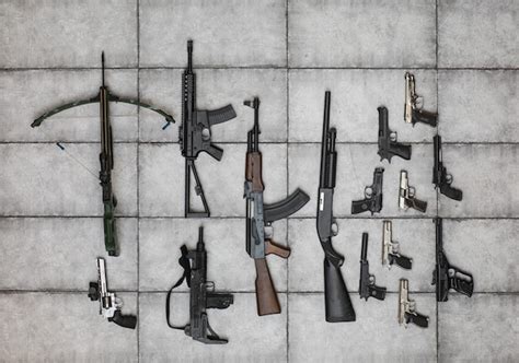 Premium Photo Arsenal Of Weapons Collection Closeup Of Guns And Grips