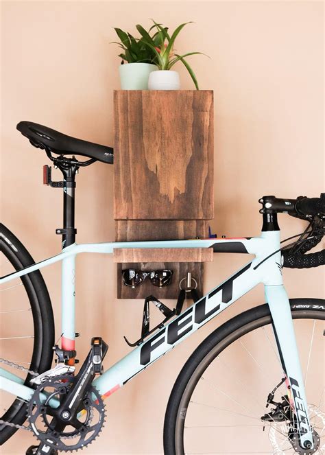 Rated for bikes up to 15kg, the rack is designed to be. DIY Wall Mounted Bike Rack - DIY Huntress