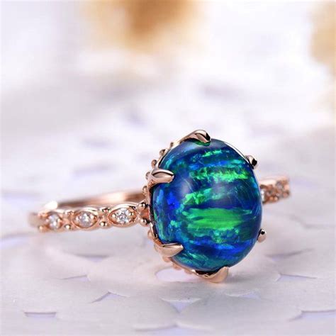 You need to buy an engagement ring, and you've done your research. Blue Opal Engagement Ring Oval 14k 18k Rose Gold 925 ...