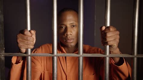 African American Man Behind Bars Racism In The Prison System