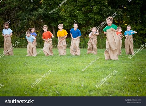 Happy Kids Having Potato Sack Race Stock Photo 1363404071 Shutterstock