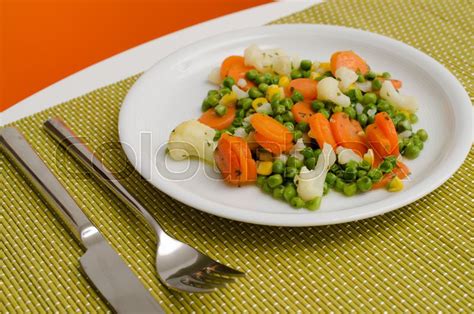 Cooked Vegetables On A White Plate Stock Image Colourbox