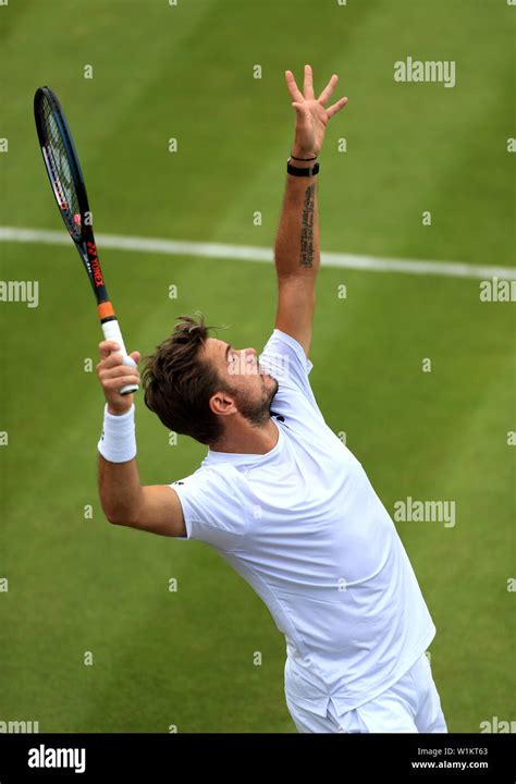 stan wawrinka in action against reilly opelka on day three of the wimbledon championships at the