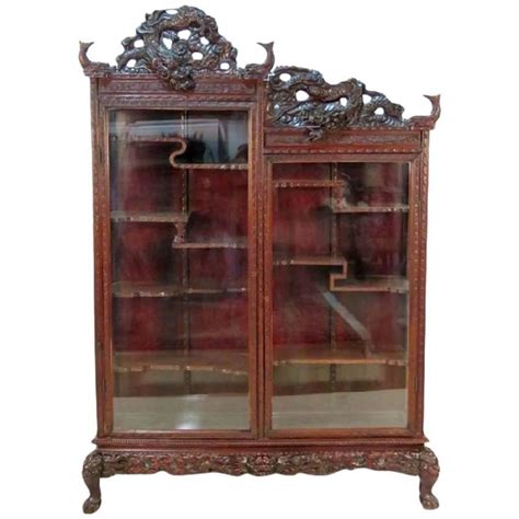 Glass curio cabinets glass cabinet doors glass shelves display cabinets china cabinets curio madison old world dark brown wood glass metal corner curio. Antique Chinese Figural Carved Curio Cabinet at 1stdibs