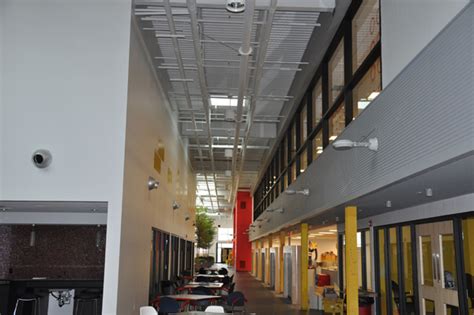 Choosing between an exposed ceiling and a suspended ceiling is a key decision in building in general, exposed ceilings use less materials but are more demanding in labor and maintenance. new-main-corridor-with-exposed-sprinklers - A.L. Fire ...