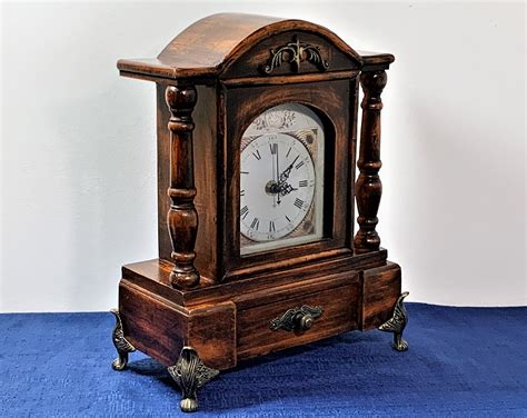 Vintage Victorian Style Carved Wood Mantle Clock Ornate Metal Feet