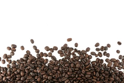 A Pile Of Coffee Beans On A White Background