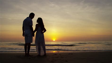 Couple Silhouette At The Beach Sunset Light Stock Footage Video