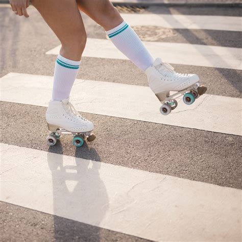 Low Section Of Female Skater Skating On Crosswalk Free Photo Nohat