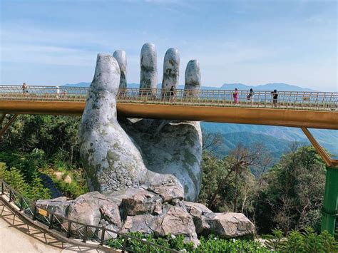 Visiting Vietnams Golden Giant Hand Bridge In Ba Na Hills Girl Eat World