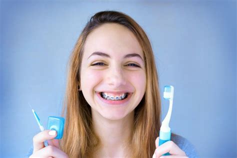 How To Brush Teeth W Braces And The Best Braces Cleaning Tools