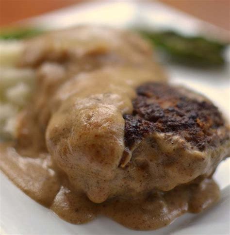 Add all the gravy ingredients to the pan and whisk together well to remove most of the lumps. Hamburger Steak with Country Gravy | Small Town Woman
