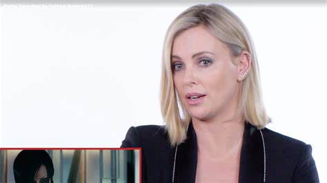 Watch Charlize Theron Gently Cringe At Her Bad Spy Movie Fashion