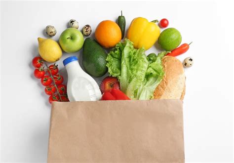 Paper Bag With Different Groceries On White Top View Stock Image