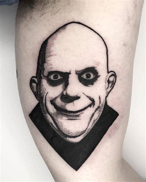 Uncle Fester Tattoo On The Inner Arm