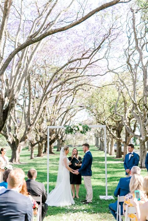 an elegant brisbane wedding with jacaranda trees with love brisbane wedding decorators