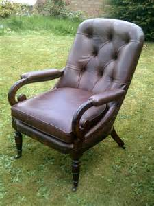 This pair of antique english regency style armchairs is made out of solid mahogany wood. Regency Leather Armchair - Antiques Atlas