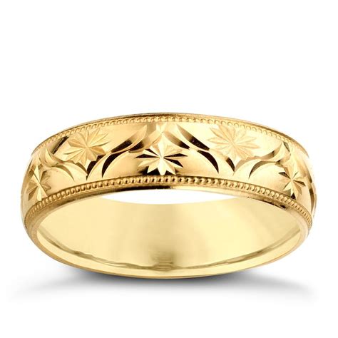 This set comes with a matching 14k gold engagement ring and wedding band. 9ct Yellow Gold Men's Patterned Wedding Ring | H.Samuel