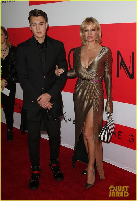 Pamela Anderson Brings Hot Son Brandon To Gunman Premiere Photo