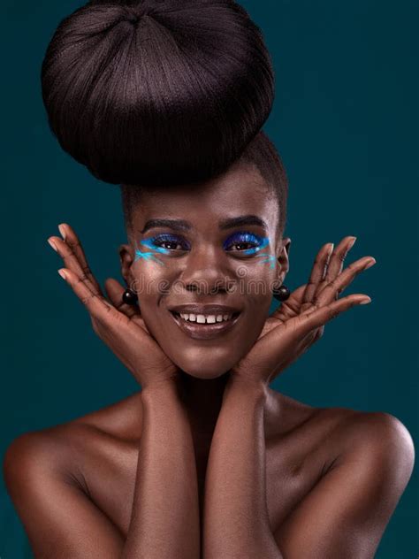 Portrait Hands And Makeup With An African Woman In Studio On A Blue Background For Beauty Or