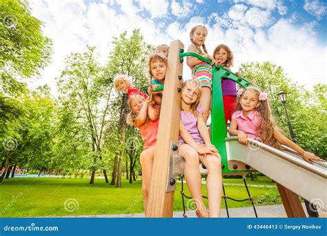 Happy Kids On Playground Chute In The Park Stock Image Image Of