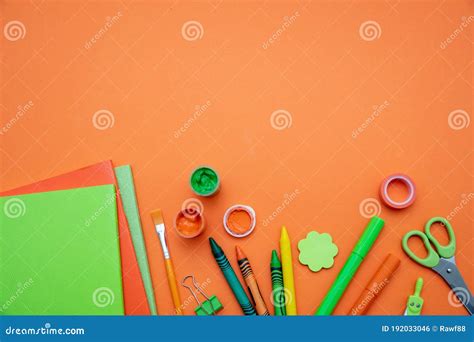 School Supplies On Orange Color Background Top View Copy Space Stock