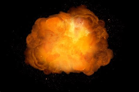Realistic Explosion Orange Color With Sparks Isolated On Black