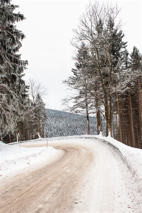 Snowy Mountain Road Risk Of Ice Path In Snowy Woods Stock Image