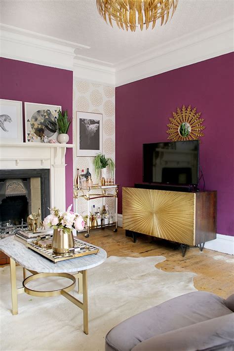 Plum Glam Living Room With Gold Sideboard Bar Cart And Fireplace