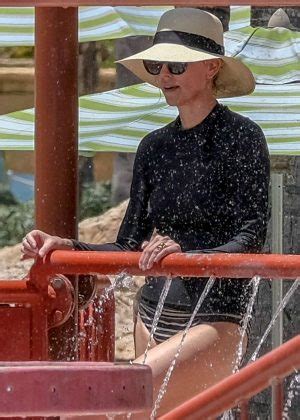 Charlize Theron In Bikini Bottoms At The Beach In The Bahamas GotCeleb