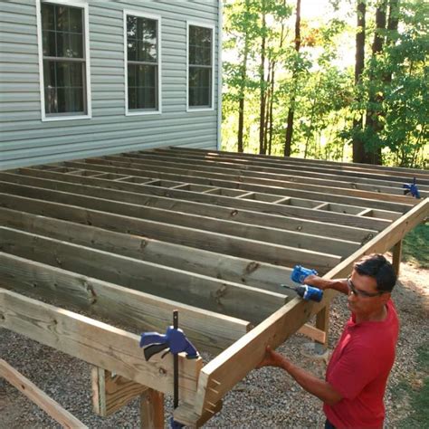 How To Build A Deck Post Holes And Deck Framing Deck Framing Deck