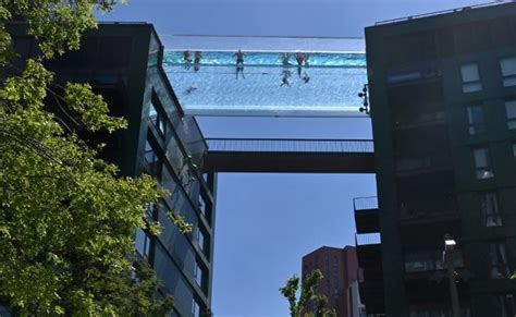 A Look At The Worlds First Floating Sky Pool Suspended Between Two