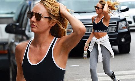 Candice Swanepoel Bares Her Taut Midriff In Sports Bra In New York Daily Mail Online