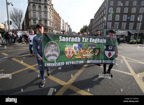 new ira support group saoradh parades through dublin city centre in paramilitary uniforms