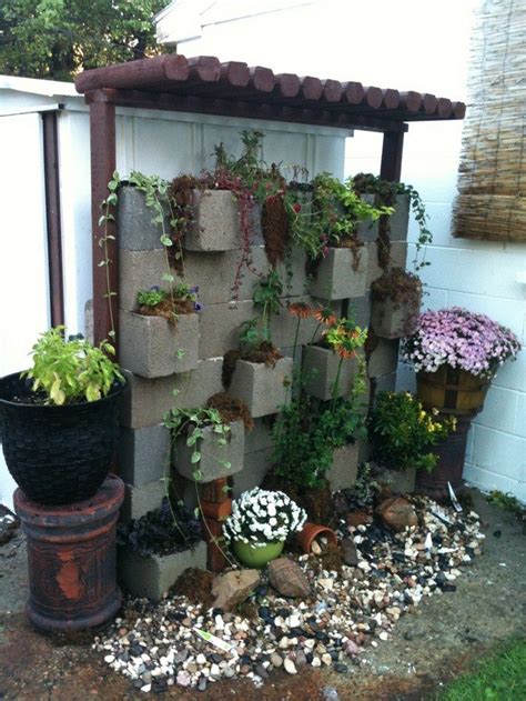Practical pretty retaining wall ideas green vibrant. Vertical garden from cinder blocks - DIY projects for ...