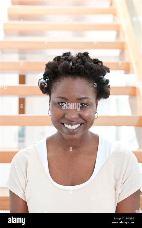 Black Woman Sitting On Stairs Stock Photo Alamy