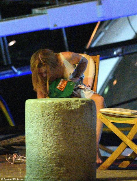 Lindsay Lohan Stumbles Up To Her Boat Barefoot After Late Night In St