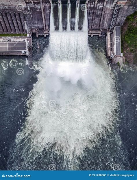 Waterfall At Hydroelectric Power Plant Dam Semicircular Spillway Near