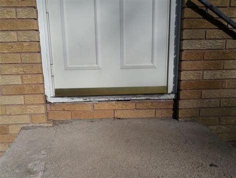 Door installation instructions from several manufacturers require that the masonry openings be plumb, level, and the exterior face of the opening in a flat plane with less than 1/8 in. How to flash a door sill - GreenBuildingAdvisor