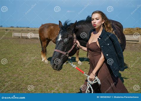 Beautiful Brunette Woman In Nature With A Horse Stock Image Image Of