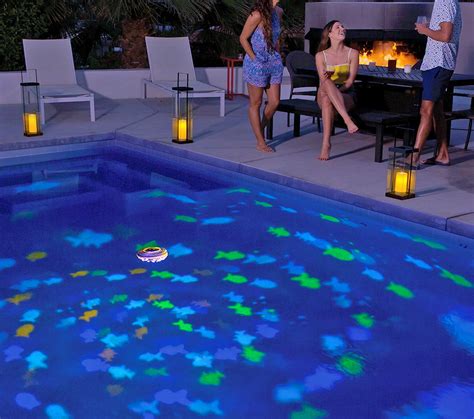 This Floating Pool Projector Light Turns Your Pool Into An Aquarium At