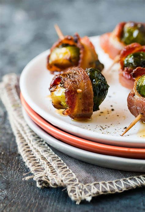 Brussels sprout and chestnut soup, brussels sprout and chicken stir fry, brussels sprouts and carrot… trusted results with brussel sprouts and mape syrup recipe. Bacon Wrapped Brussels Sprouts with Maple Syrup - Garnish ...