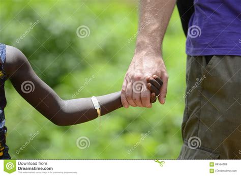 Different Cultures Holding Hands Sharing Lifestyle Experience Stock