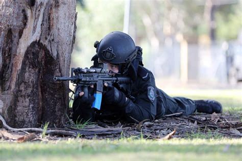 A Nsw Police Force Tactical Operations Unit Operator Lays At The Base