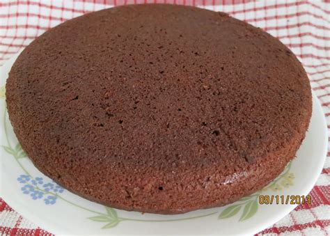 Reduce the speed to low and add boiling water to the cake batter a little bit at a time. Simply Delicious: Eggless Chocolate Cake Using Milk powder