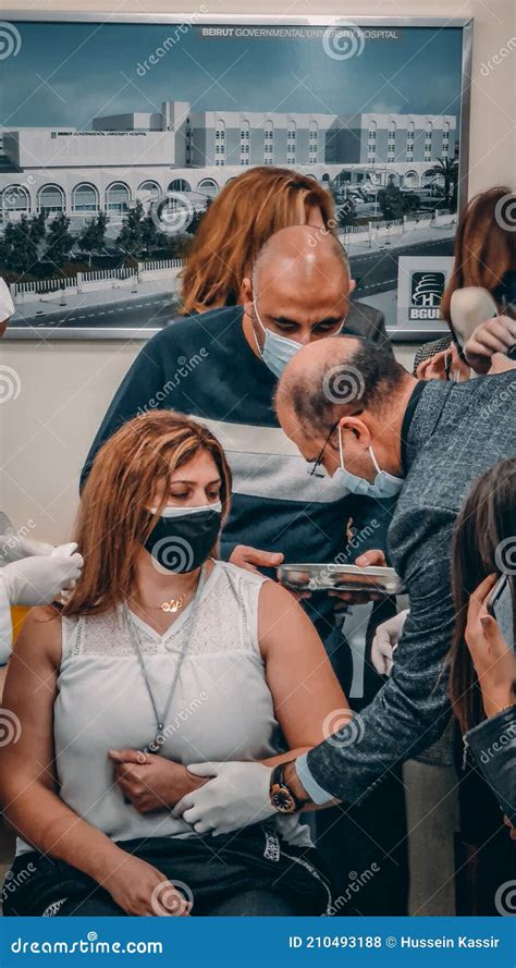Lebanese Minister Of Public Health Vaccinating First Lebanese Citizen