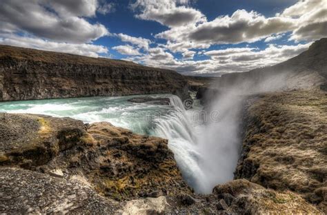 Gullfoss Emblematic Stepped Waterfall Located At A Pronounced Elbow Of