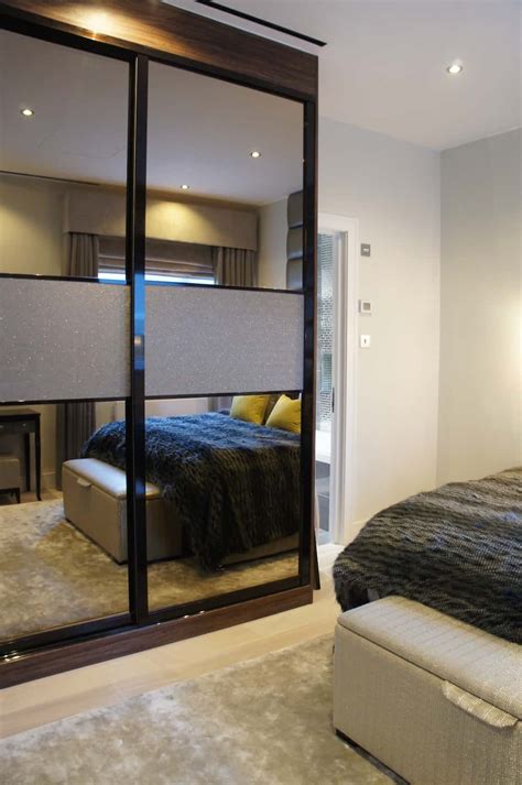 The task designing fitted wardrobes with mirror sliding doors in an awkward shaped space. Fitted Wardrobes | iwardrobes