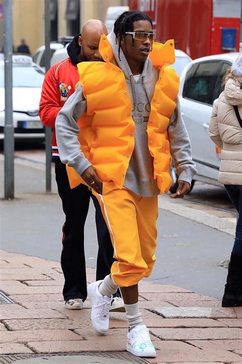 Asap Rocky Wears Balenciaga Jacket Gucci Hoodie And Custom Nike