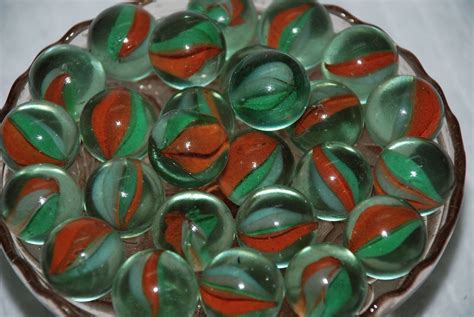 Marbles is a game played by children with small, round glass balls called 'marbles'. 14mm,16mm,19mm,25mm glass marbles/cat eye toy marble ...
